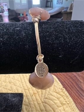 Bourbon and Bowties Gold-tone Bangle with Blush Stone Charm